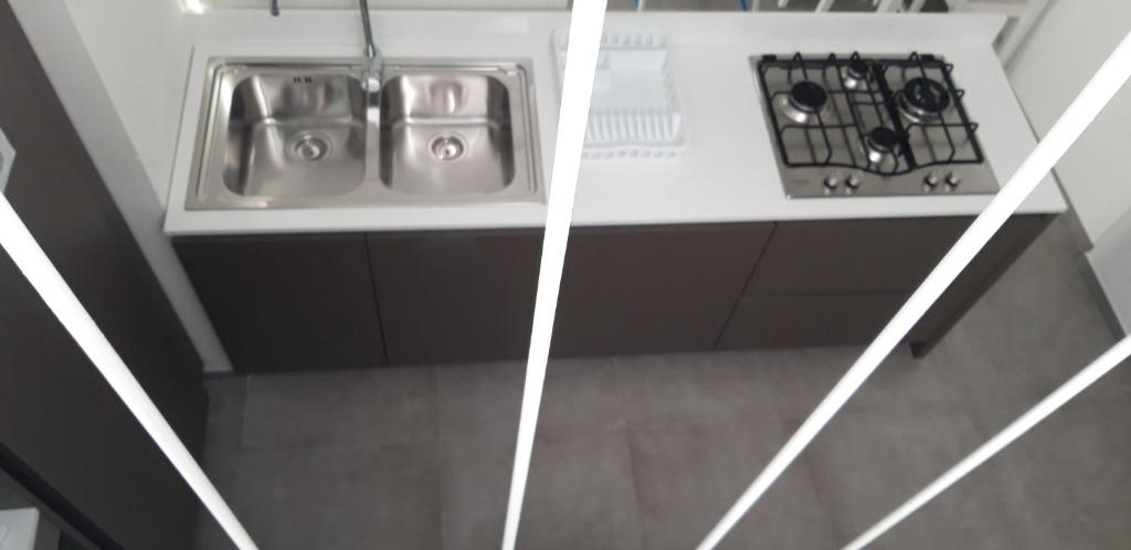 an overhead view of a stove in a kitchen at Appartamenti porta mare in Otranto