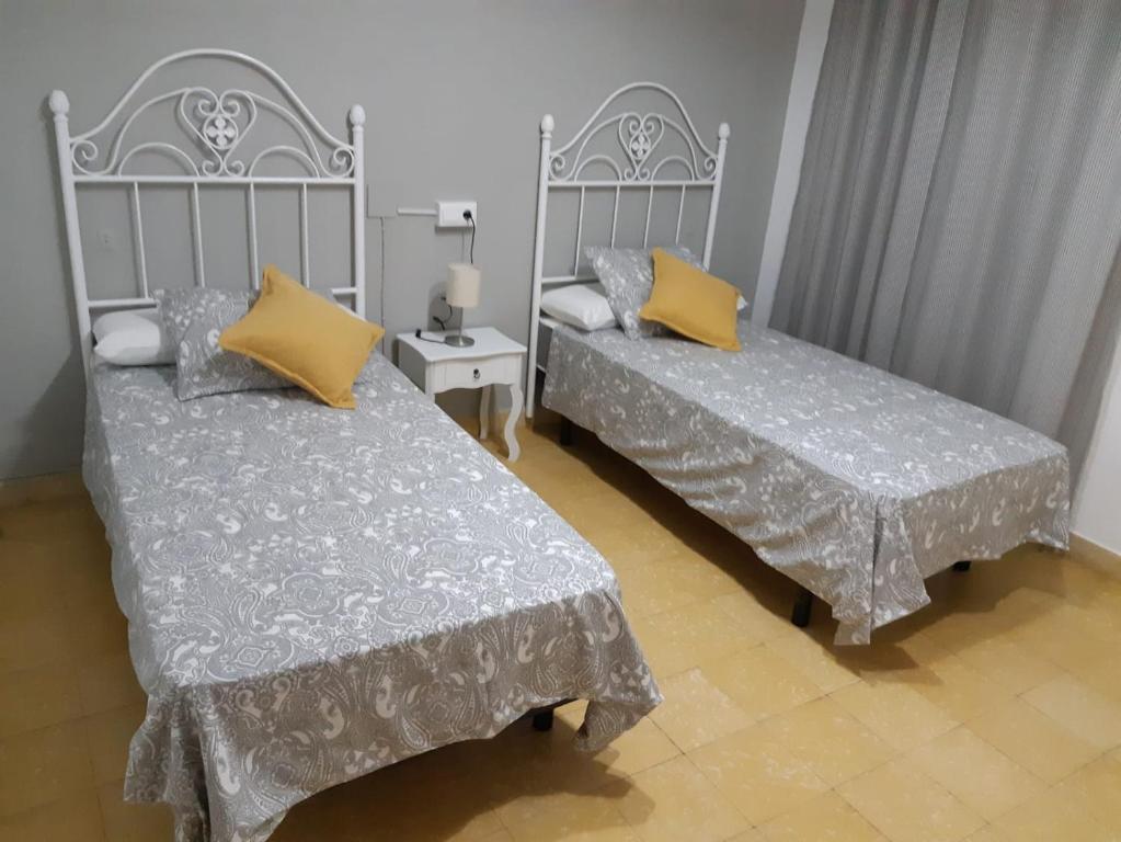 Postel nebo postele na pokoji v ubytování Casa de Antoniana