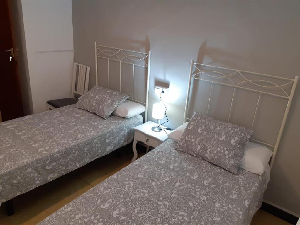 Postel nebo postele na pokoji v ubytování Casa de Antoniana