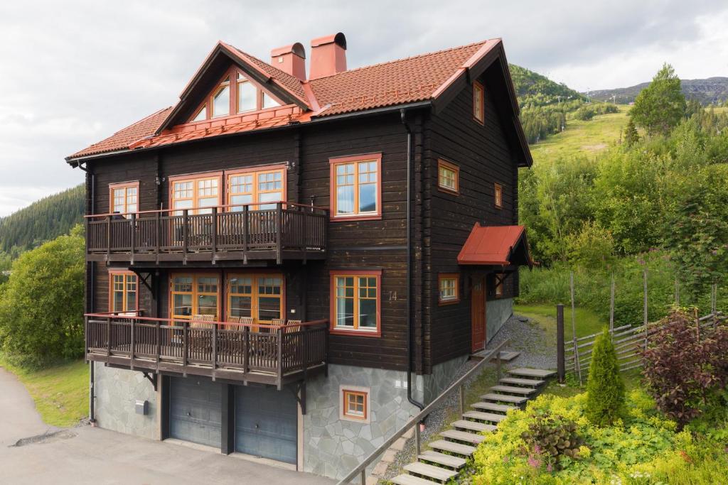 a house on the side of a hill at Åre Travel - Tottvillan in Åre