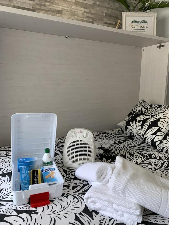 Posteľ alebo postele v izbe v ubytovaní Sol Ohana Apartamento Boutique