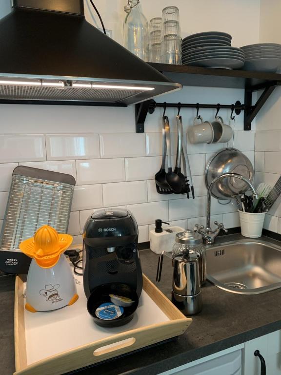 Kuchyňa alebo kuchynka v ubytovaní Sol Ohana Apartamento Boutique