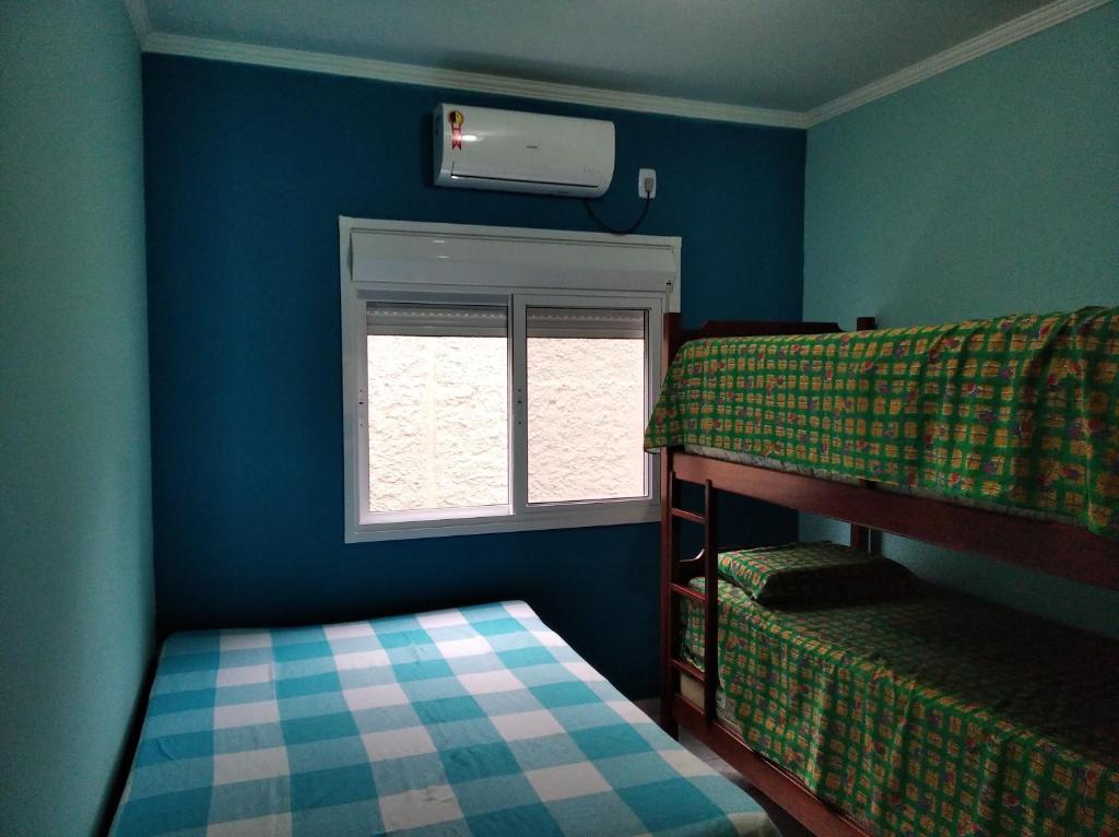  Apartamento em maranduba com ar condicionado