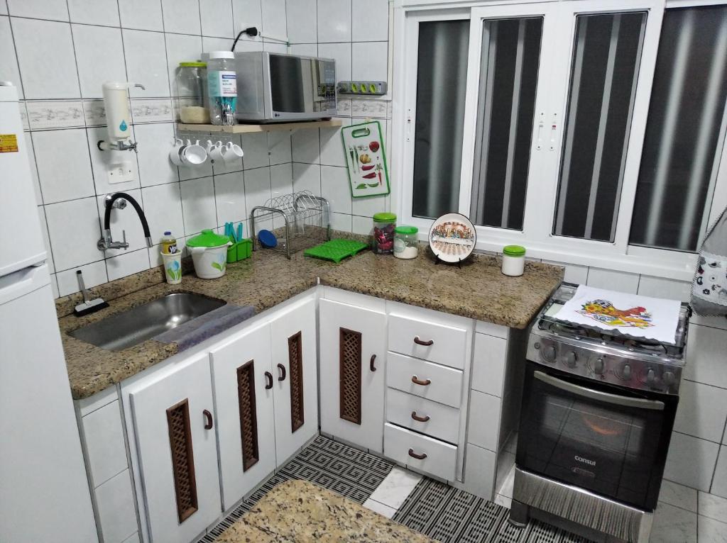  Apartamento em maranduba com ar condicionado