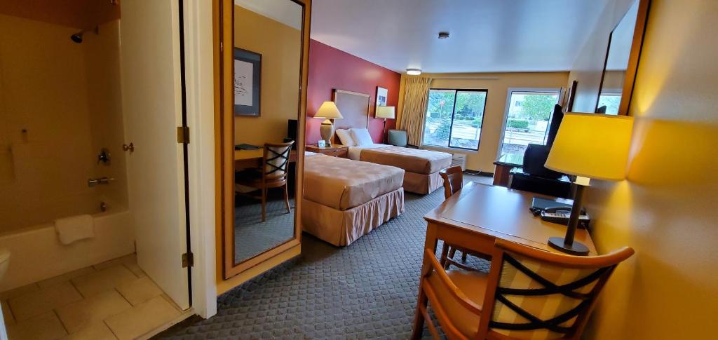 Letto o letti in una camera di Olympic View Inn