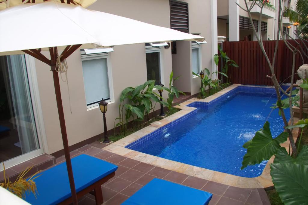 Bazén v ubytování Bali Hotel nebo v jeho okolí