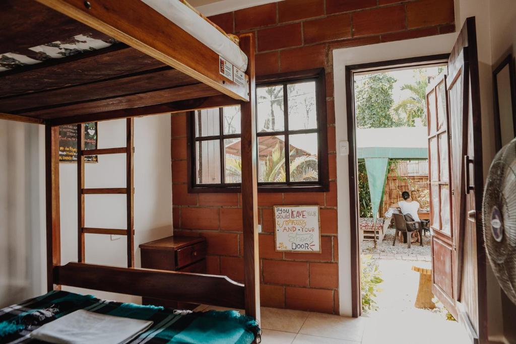 Postel nebo postele na pokoji v ubytování Esperanto Bed & Breakfast Surf Hostel