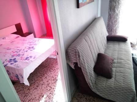 Postel nebo postele na pokoji v ubytování Torrevieja Playa Cura