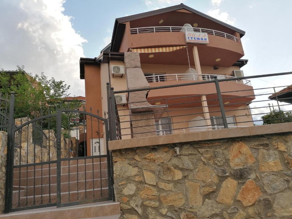 a building with a gate in front of it at Vila Stefan in Star Dojran