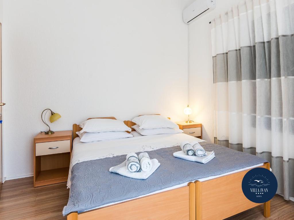 Postel nebo postele na pokoji v ubytování Villa Ivan