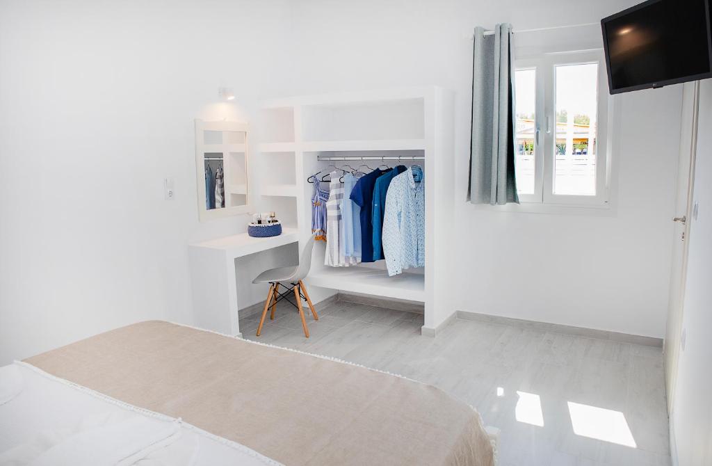Postel nebo postele na pokoji v ubytování Grozos Rooms