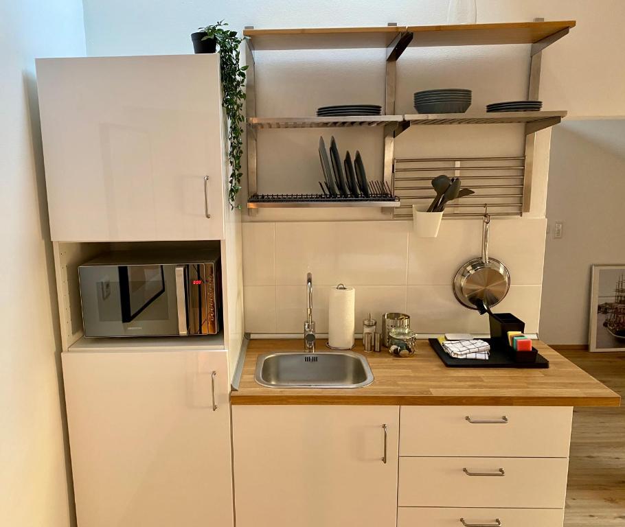 Kuchyň nebo kuchyňský kout v ubytování Fürthpartments