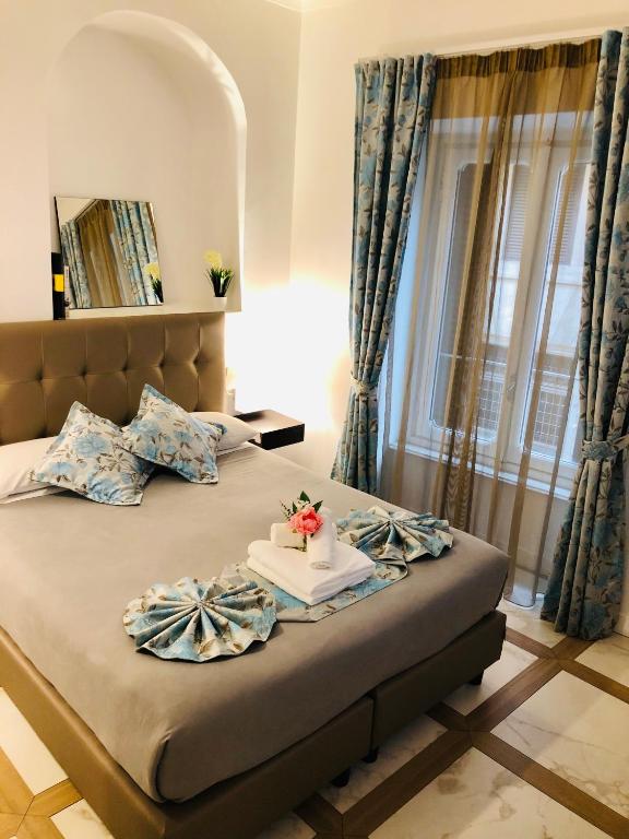 Posteľ alebo postele v izbe v ubytovaní KAMBAL LUXURY SUITES