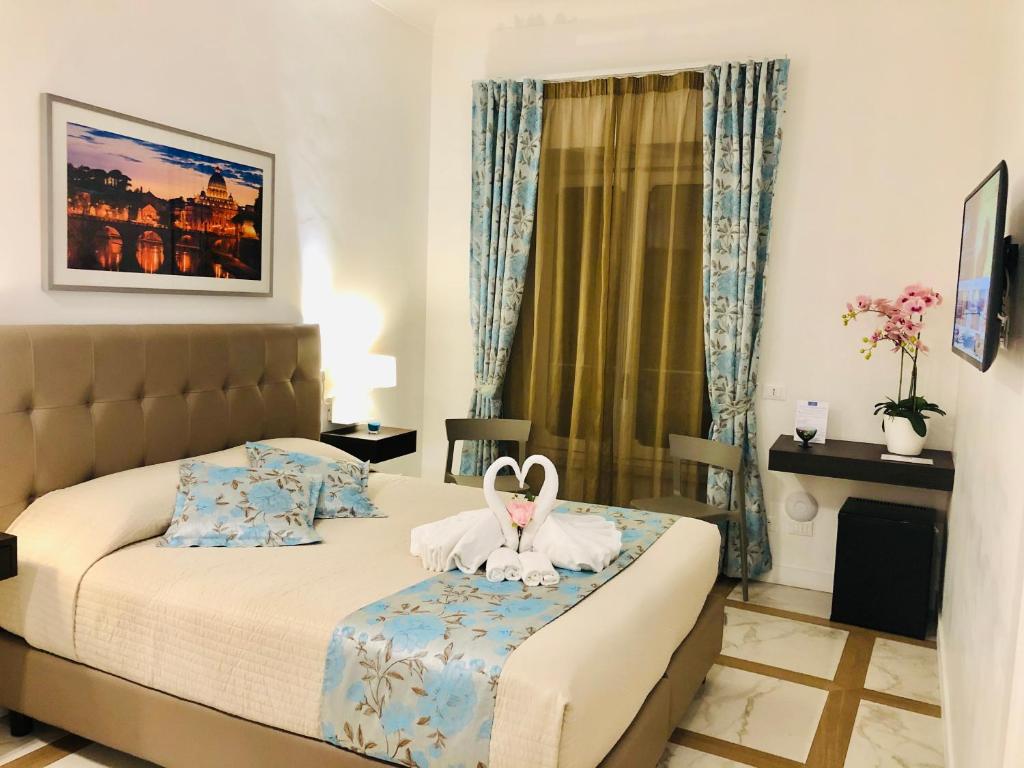 Posteľ alebo postele v izbe v ubytovaní KAMBAL LUXURY SUITES