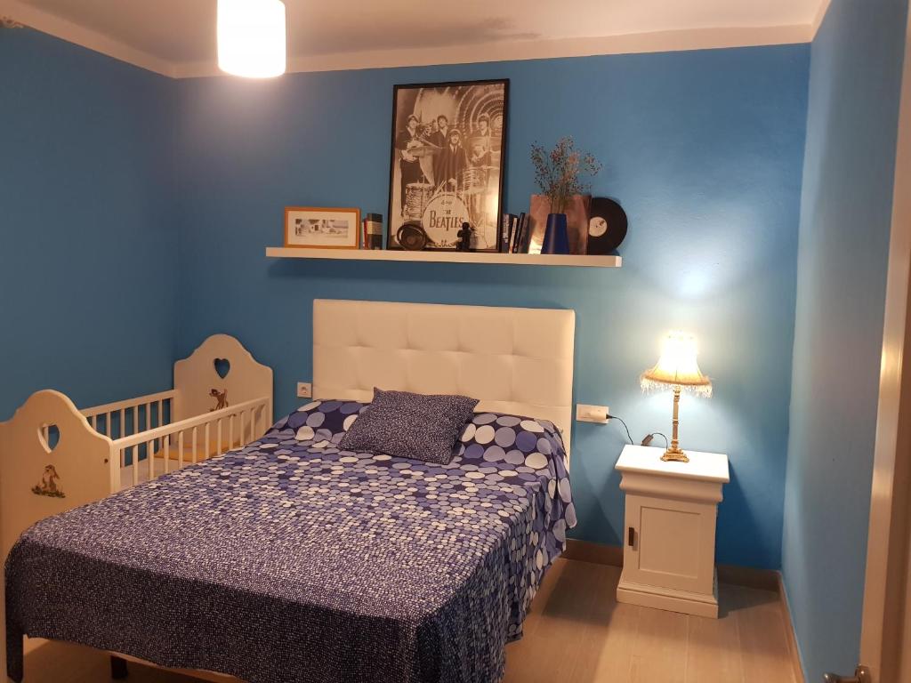 A bed or beds in a room at Villa Mirador del Sol, 45min playas de Doñana, 35min de Sevilla