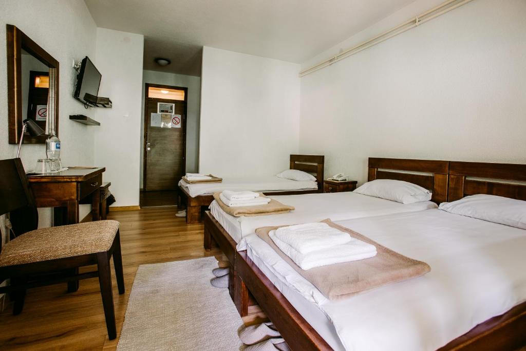 Postel nebo postele na pokoji v ubytování Restoran sa prenoćištem Gornjak