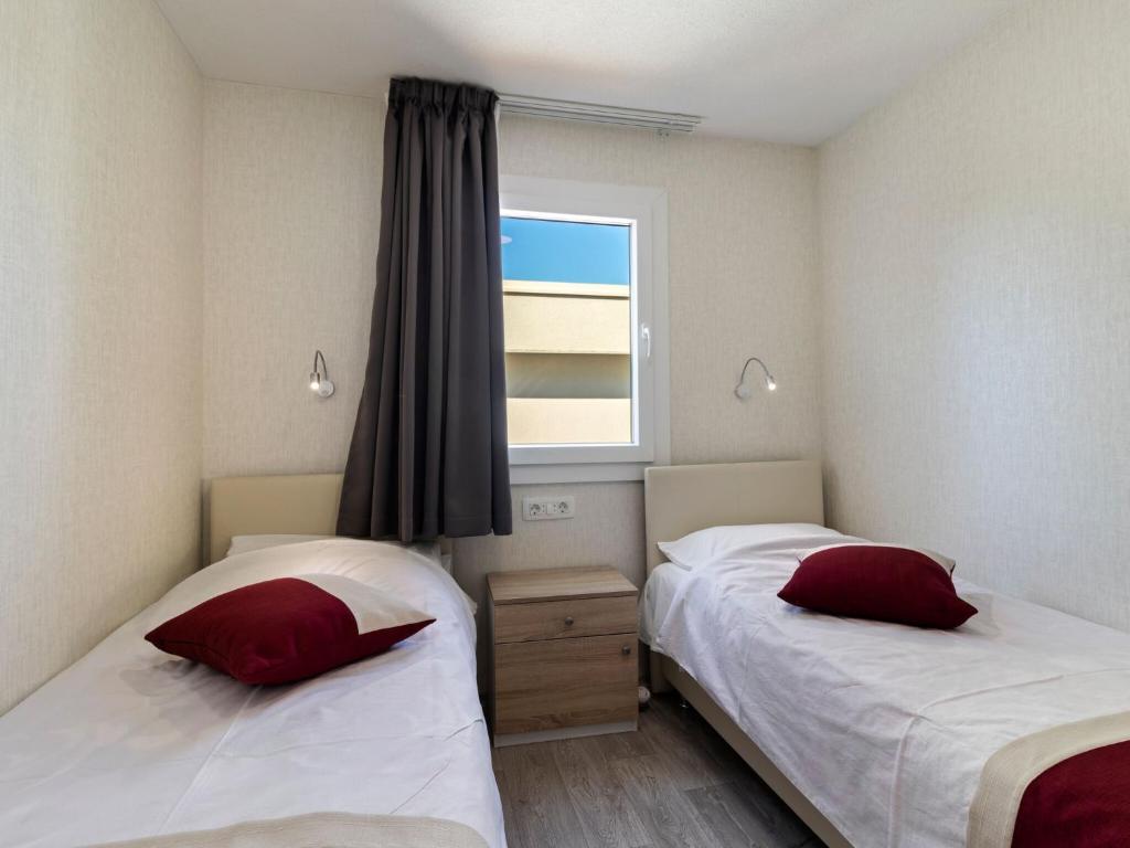 Posteľ alebo postele v izbe v ubytovaní Seaside Escape in Banjole Bay