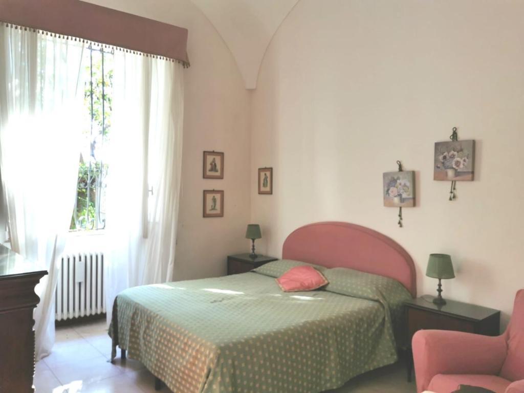 A bed or beds in a room at OASI DI PACE A GAETA