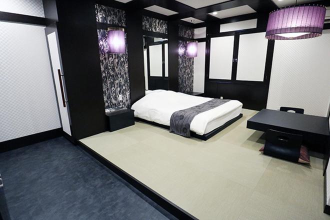 Postel nebo postele na pokoji v ubytování ホテルレックス諏訪 -レジャーホテル -