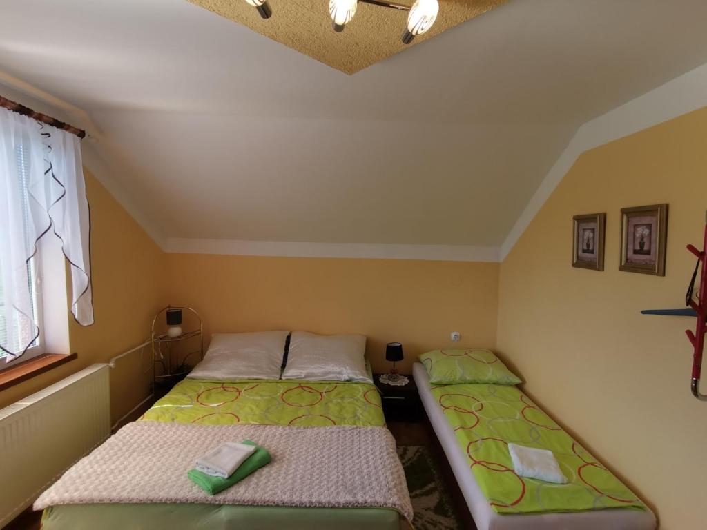 Postel nebo postele na pokoji v ubytování Privát u Bartolomeja