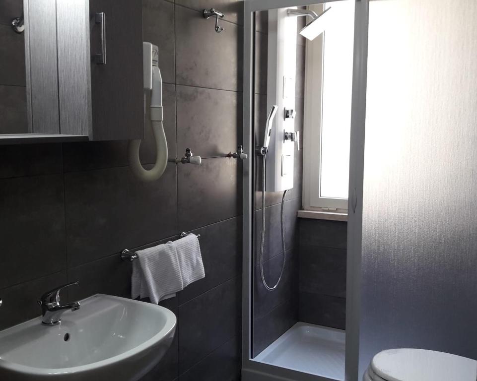 Koupelna v ubytování Hotel Marconi