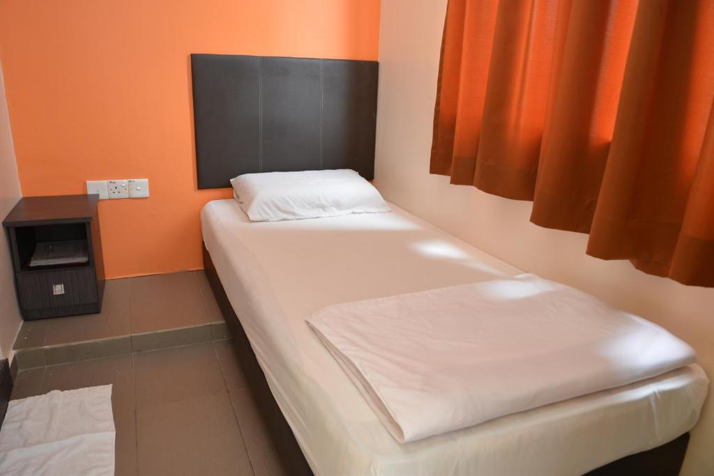 Postel nebo postele na pokoji v ubytování GF WONDERFUL HOTEL