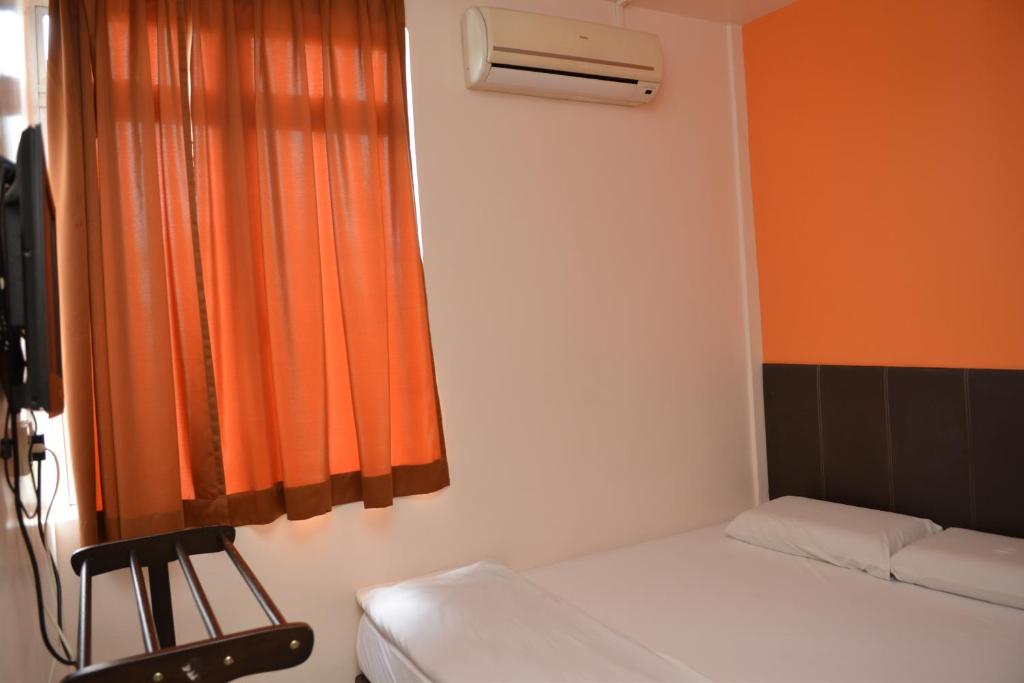 Postel nebo postele na pokoji v ubytování GF WONDERFUL HOTEL