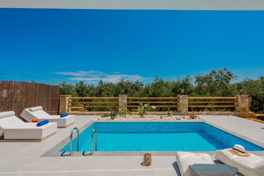The swimming pool at or close to Queen of Zakynthos Luxury Villas