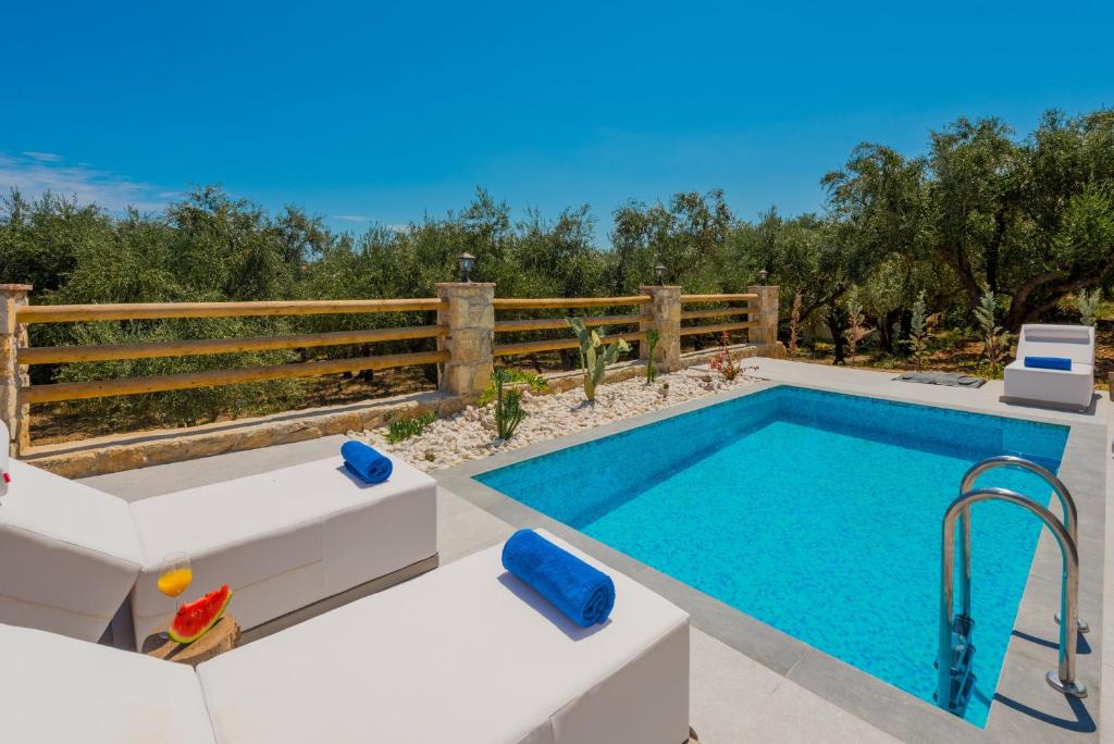 The swimming pool at or close to Queen of Zakynthos Luxury Villas