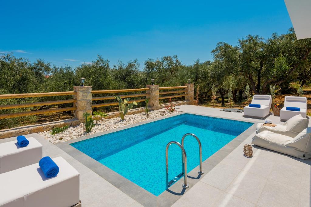 The swimming pool at or close to Queen of Zakynthos Luxury Villas