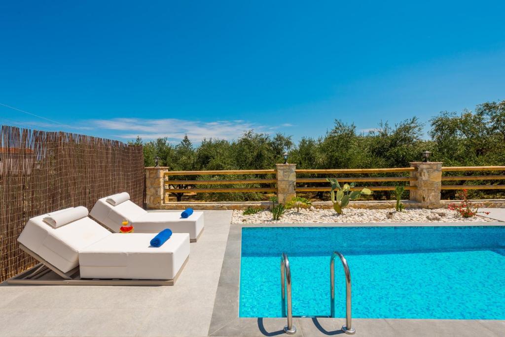 The swimming pool at or close to Queen of Zakynthos Luxury Villas