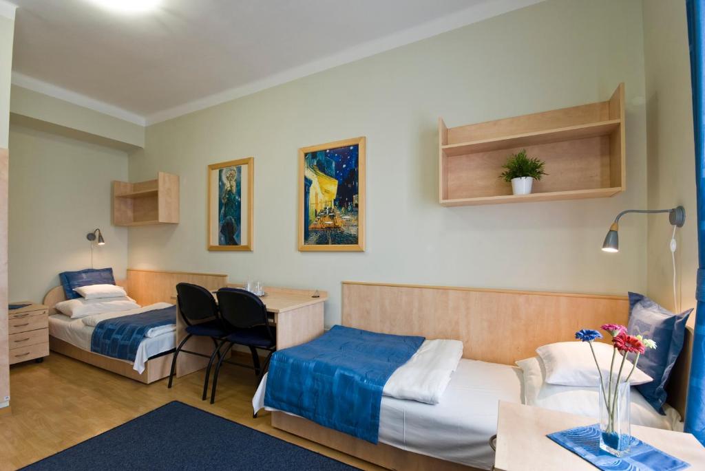 Voodi või voodid majutusasutuse Hotel Kerpely toas