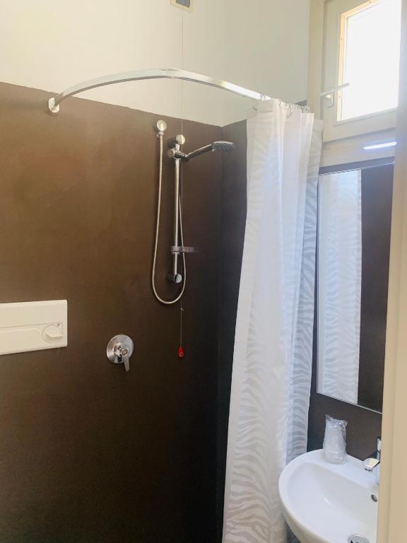 Koupelna v ubytování Hotel Conca D'Oro ***S
