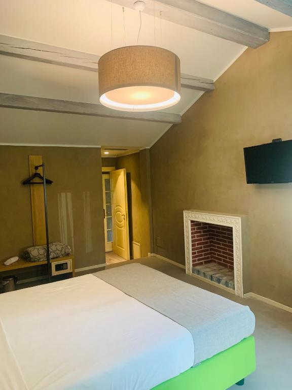 Postel nebo postele na pokoji v ubytování Hotel Conca D'Oro ***S
