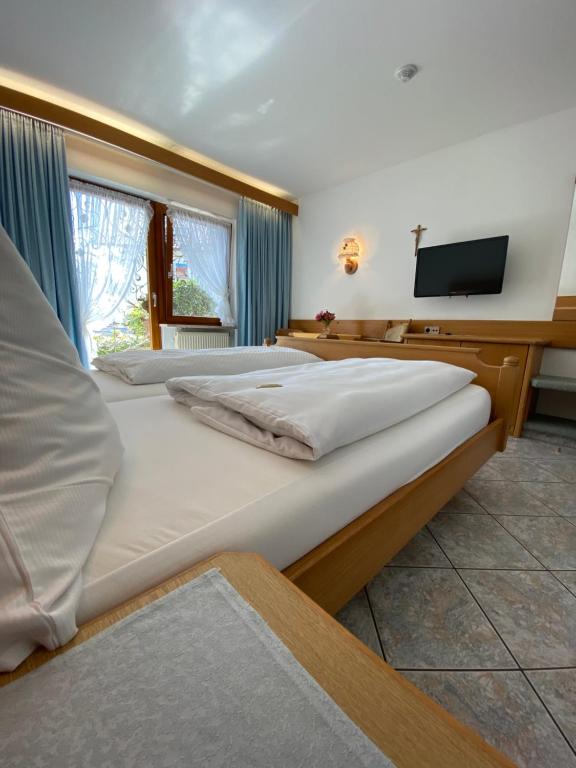 Postel nebo postele na pokoji v ubytování Hotel Haus Seehang