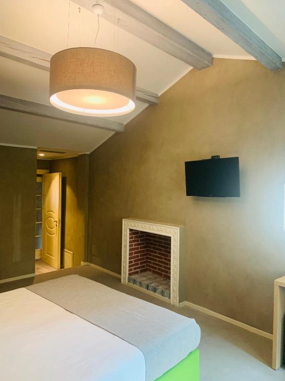 Postel nebo postele na pokoji v ubytování Hotel Conca D'Oro ***S