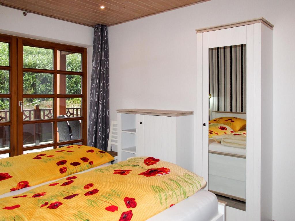 Postel nebo postele na pokoji v ubytování Apartment Zeit zum Träumen I by Interhome