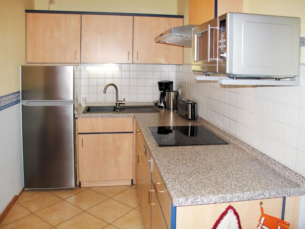 Kuchyň nebo kuchyňský kout v ubytování Apartment Zeit zum Träumen I by Interhome