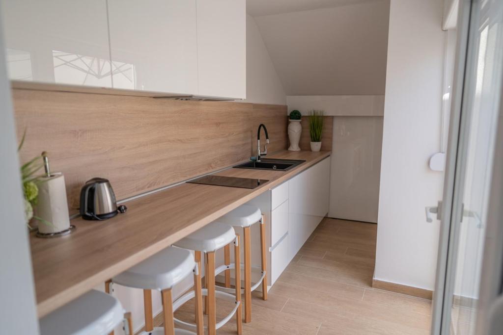 Kuchyňa alebo kuchynka v ubytovaní Apartment Portolan