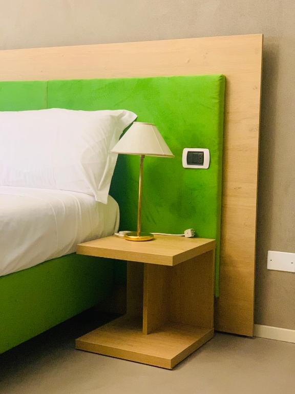 Postel nebo postele na pokoji v ubytování Hotel Conca D'Oro ***S