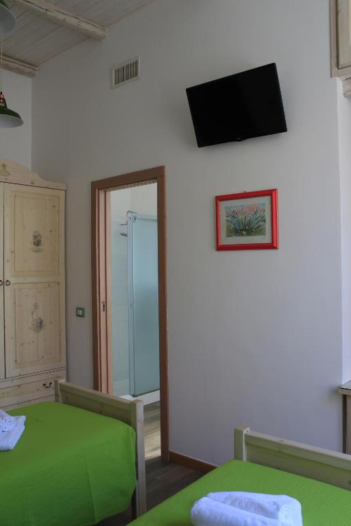 Uma cama ou camas num quarto em Elementa