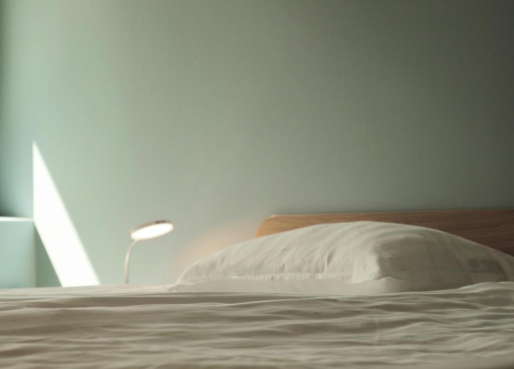 Postel nebo postele na pokoji v ubytování Hotell Munkeröd
