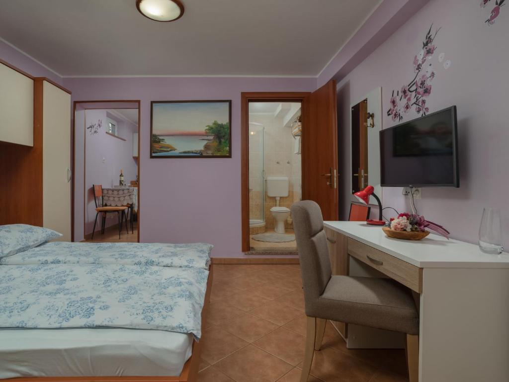 Posteľ alebo postele v izbe v ubytovaní Apartment Jukić-1 by Interhome