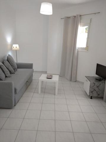 Posezení v ubytování Kavala Home 1