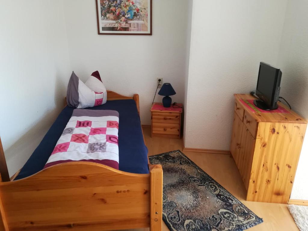 Postel nebo postele na pokoji v ubytování Brauhaus Fröschl
