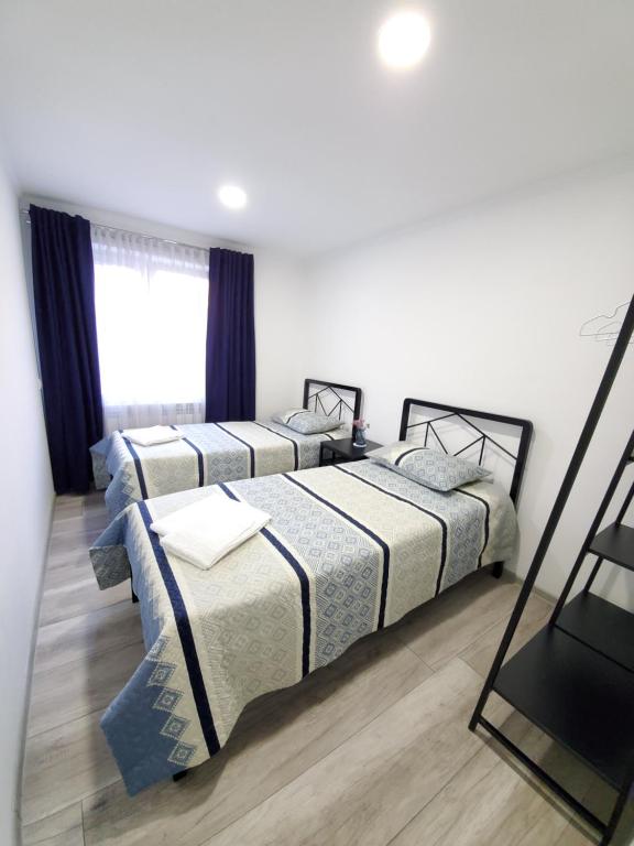 Postel nebo postele na pokoji v ubytování Central Guesthouse Gyumri