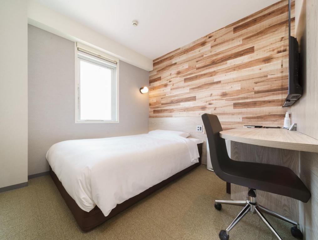 TV a/nebo společenská místnost v ubytování Super Hotel Tokyo JR Kamata Nishiguchi