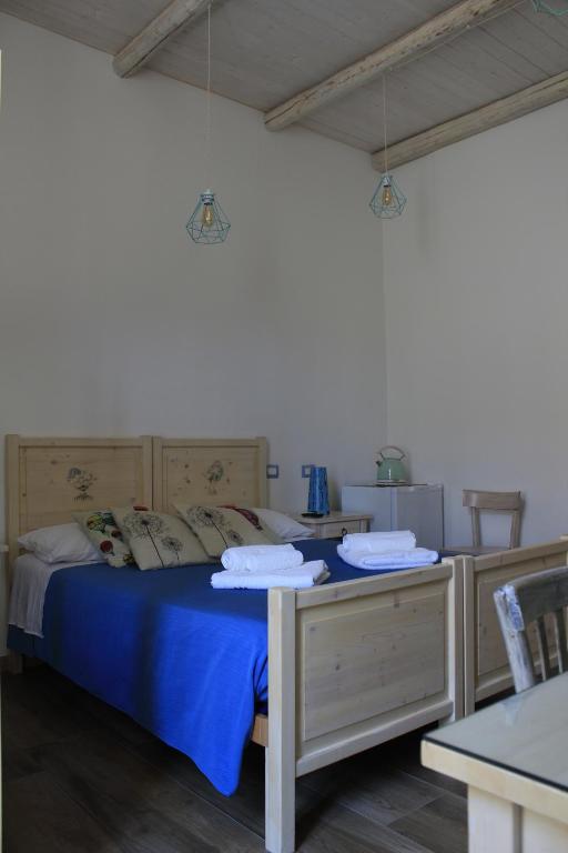 Uma cama ou camas num quarto em Elementa