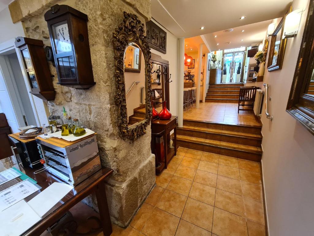 Kuchyň nebo kuchyňský kout v ubytování Hotel Jacobeo