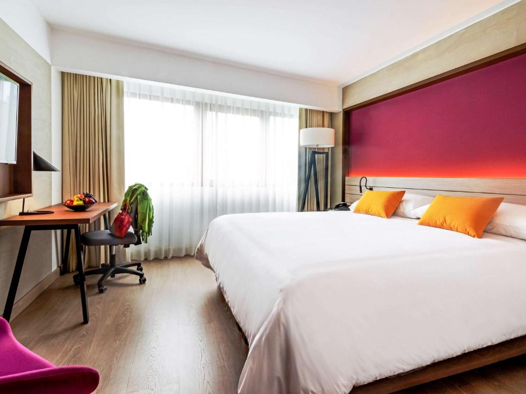 Ένα ή περισσότερα κρεβάτια σε δωμάτιο στο Mercure Ariosto Lima